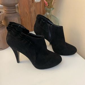 Black thin heeled booties